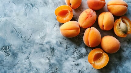 Fresh organic apricots on textured background Clean eating concept healthy vegan snack raw diet Close up view with copy space