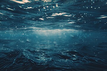 Wall Mural - Dark blue ocean surface seen from underwater