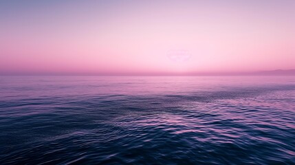 Poster - A photo of the ocean surface at sunrise, with a pink and purple sky reflecting on the water