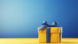 © CrazyJuke - Vibrant slide Blue gift box on bright yellow bg with text space