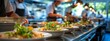 © auttawit - A group of chefs are preparing food in a kitchen. The food is arranged on a long counter with many plates of food. Scene is busy and focused, as the chefs are working together to prepare the dishes
