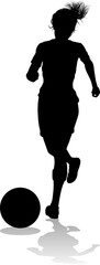 Wall Mural - A female soccer football player woman in silhouettes