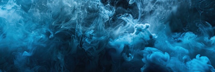 Swirling blue smoke or ink in water creating abstract patterns and textures Mysterious fluid art background
