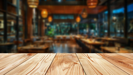 Wall Mural - Featuring wooden table in foreground, with softly blurred background of chic restaurant during night scene. The table serves as perfect platform for food-related presentations or advertising