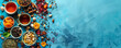 © AI_images - A vibrant tea background with a variety of colorful tea blends, dried fruits, and spices arranged on a bright blue surface