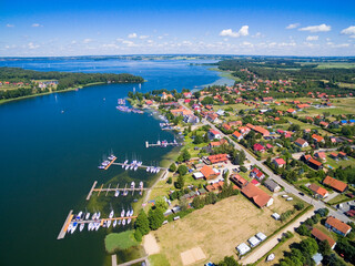 Canvas Print - Aerial view of Rydzewo village on the shore of Boczne Lake, Masuria, Poland