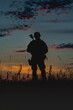 © Елена Григорова - Soldier in silhouette, standing at sunset, armed, concept of military duty, protection, defense, war, solitude