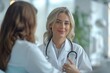 © Jane_S - Female doctor interacting with a patient, symbolizing care and patient-focused healthcare services.