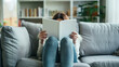 © mohammad - woman reading blank white book sitting on living room sofa, minimalist background, Ai generated Images