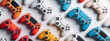 © Anna - Colorful collection of game controllers arranged in a pattern. A vibrant celebration of gaming culture. National Video Games Day.