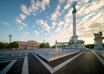 Wall Mural - Scenic view of Heroes' Square (Hosok Tere) in Budapest, Hungary with Millennium Monument, major attraction of city under picturesque sky at sunny summer day