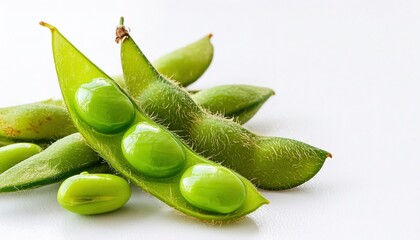 Wall Mural - Edamame - a Japanese dish prepared with immature soybeans in the pod, popular across the world because it is rich in vitamins, dietary fiber, and isoflavones. Asian cooking vegetable food and broth