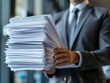 © CG Design - A law firm employee delivering legal paperwork to a courthouse for filing