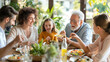 © Elena - A multi-generational family gathered around a table, sharing a meal and smiling together...Family members of different generations enjoy a joyful meal, highlighting love and togetherness.
