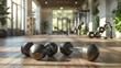 © Ninna Rodrigues - Modern gym with dumbbells in focus and behind the entire gym and its expansion