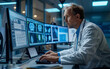 © imagineRbc - A doctor in a white coat examines brain scans on multiple computer monitors in a modern medical facility