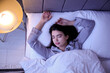 © Pixel-Shot - Beautiful young woman sleeping in bedroom at night, top view