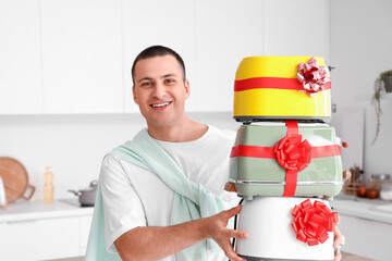 Poster - Young man with gift toasters in kitchen