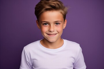 Wall Mural - Portrait of a smiling little boy in a white T-shirt.