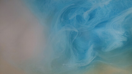 Smoke swirl. Paint water blend. Defocused blue white color glitter dust particles texture steam cloud floating spreading abstract art background.