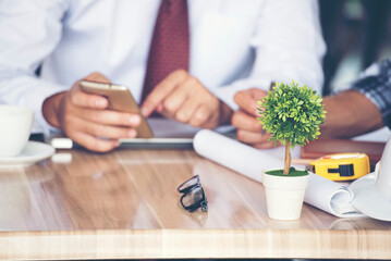 Wall Mural - Two businesspeople meeting work at office desk. Teamwork partners team with Business strategy chart graph, infographic data financial report. Team partner planning marketing finance excel stat report