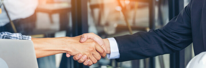 Wall Mural - Banner Trust honesty business customer handshake together promise partner. Panorama Businessman teamwork diversity solidarity team Partner hands together. Team meeting shaking hands with copy space