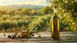 © Dirk - copy space, stockphoto, bottle with olive oil, premium quality standing on a wooden table, some olives on the table, professional publicity photo, italian olive yard in the background.