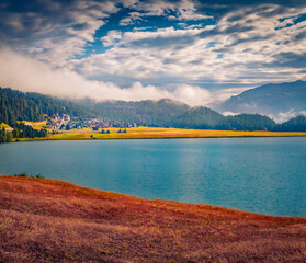 Wall Mural - Astonishing summer scene of Sils lake. Foggy morning view of Swiss Alps, Sondrio province Lombardy region, Italy, Europe. Beauty of nature concept background..