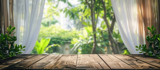 Poster - Empty wood table top with blur white curtain window and green garden background for product display template. with copy space image. Place for adding text or design