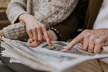 Sticker - Couple reading the newspaper together