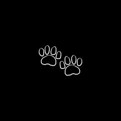 Canvas Print - Paw print hand drawn icon isolated on dark background