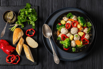 Poster - chicken meatball soup with vegetables in a bowl