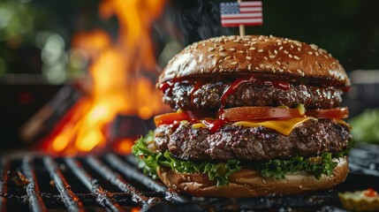 Juicy beef burger fresh off the grill, topped with cheese, lettuce, and tomato, an American stars and stripes flag toothpick on top, perfect USA holiday food on a picnic table