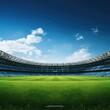 © Slanapotam - Empty modern football stadium with a blue sky and green grass field, sports banner background