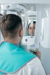 © andrew_shots - A man gets a panoramic picture of his teeth