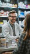 © Da - Happy Pharmacy Male Consultant Assisting Customer with Prescription. Female Pharmacist Providing Detailed Instructions to Client. Understanding Customer Listening to Professional Advice. Nurses Day, H