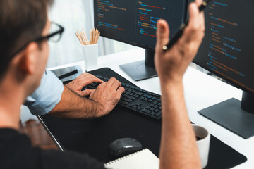 it developers creating online software development information on screen laptop with coding program 