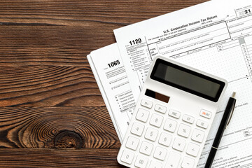 Wall Mural - Tax forms 2024 with the calculator. Income Statement. Paying the tax rate