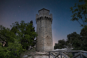 Wall Mural - front view of the third medieval tower of san marino at night