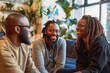 © VisualProduction - Smiling diverse colleagues discussing project in office