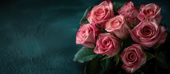 Wall Mural - A beautiful bouquet of pink roses presented with a copy space image.