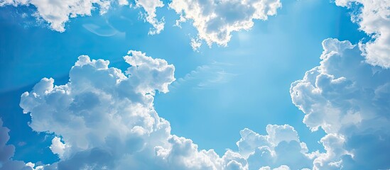 Aufkleber - Clear blue sky with fluffy clouds and copy space image.