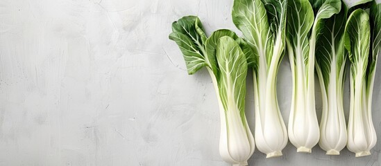 An image showcasing Pok Choi with a clean white backdrop offers ample copy space.
