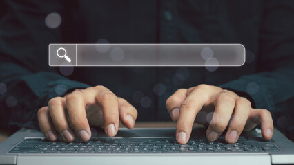 Wall Mural - seo, data search technology search engine optimization. man's hands are using a computer keyboard to