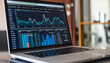© Steven - A laptop displaying various charts and graphs, focusing on data analysis and business metrics, in a professional and organized workspace