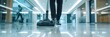 © rizky - Cleaning the Floor with a Vacuum Cleaner