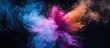 © meristock - Colorful powder exploding against a black background creates an abstract and vibrant image with copy space.