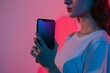 © CogniLens - Display mockup from a shoulder angle of a girl holding an smartphone with an entirely black screen