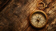 © LiezDesign - Old Vintage Compass on a wooden background, Capture the spirit of exploration and adventure with a classic photo.