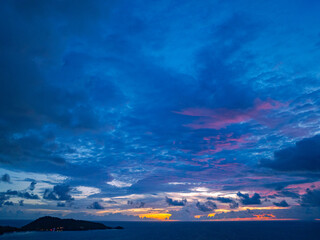 light pink cloud in the dark blue sunset.Unconventional and beautiful natural views of the sea..Nature video High quality footage..Unique and creative travel and nature idea